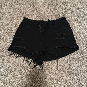 Black high rise jean shorts.
